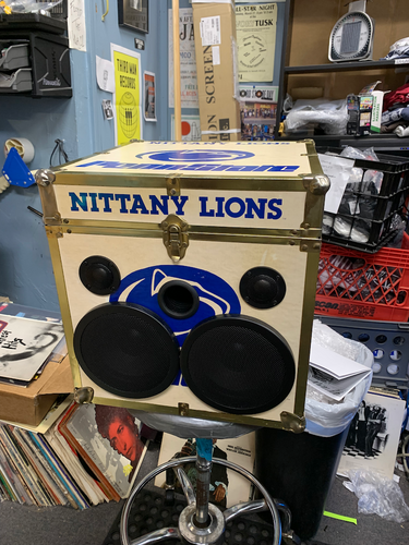 1 Penn State case and 1 old suitcase